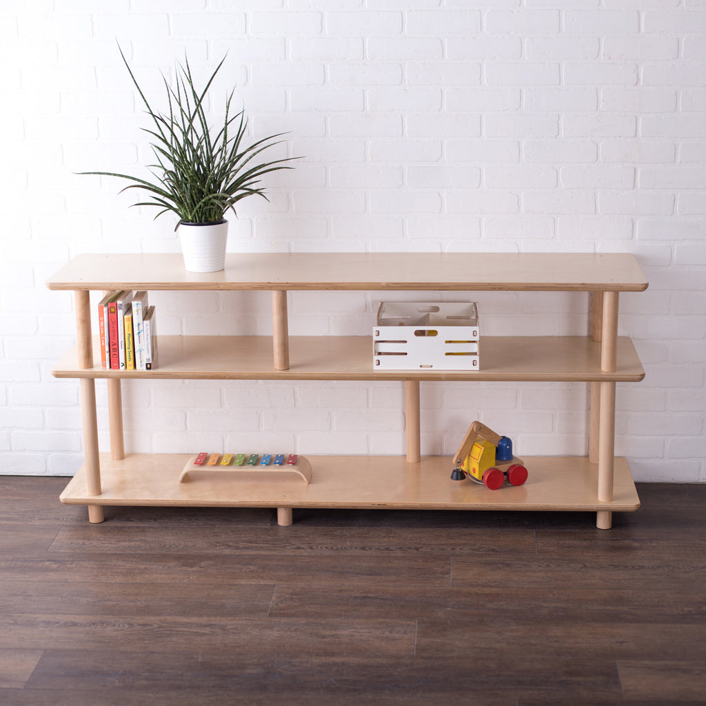 A 60 to grow shelf open shelving unit with wooden toys