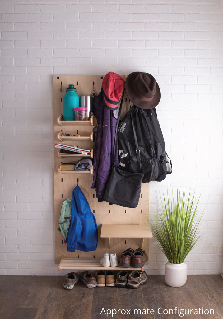 Large entryway Makerwall with jackets, shoes and water bottles.