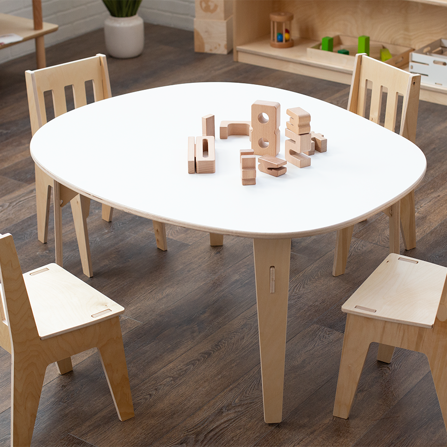 White laminate pebble table with 4 chairs.