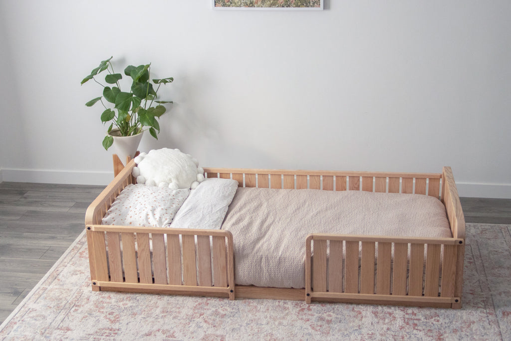 A twin platform bed with two headboards, a full side board, two 1/3 rails, and no legs