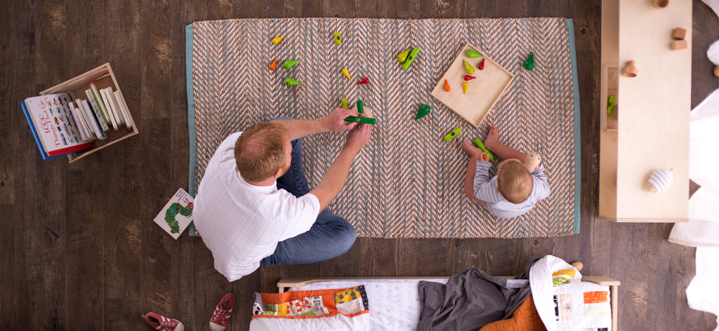 Parent playing with child. 