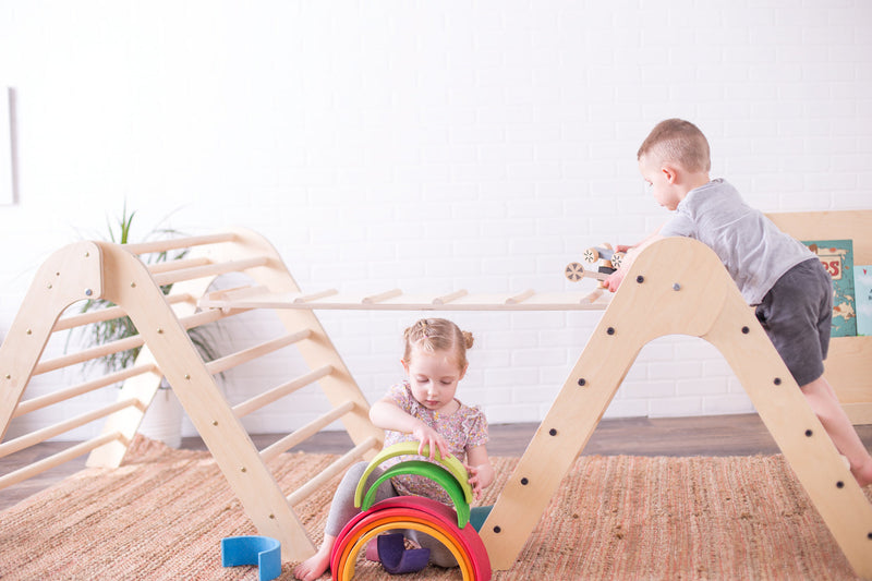Child on a climbing triangle