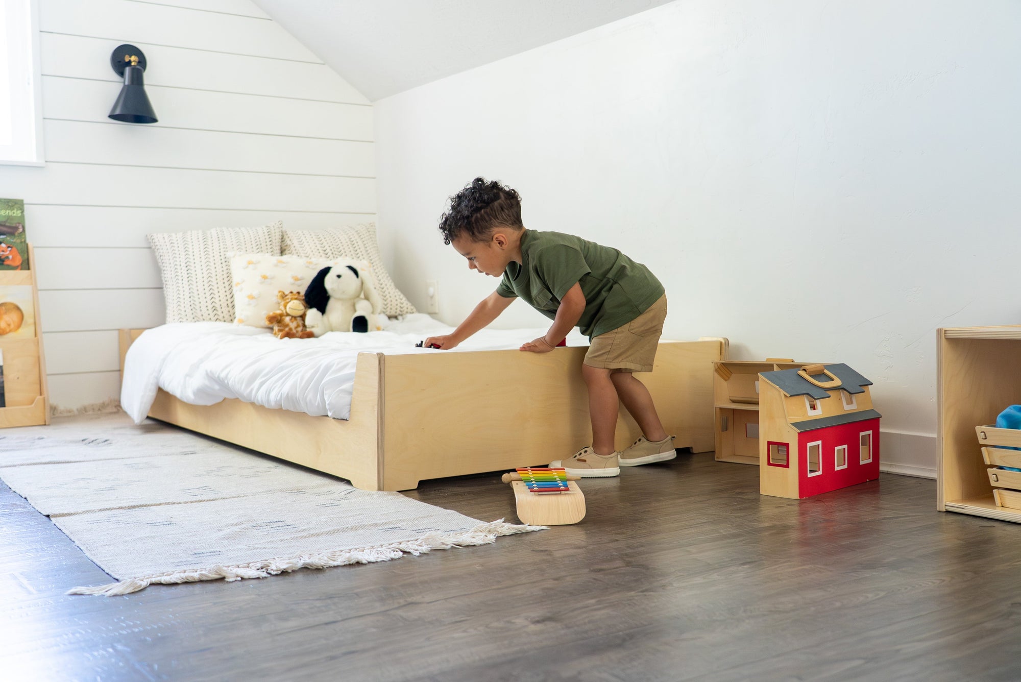 Child with a Floor Bed in a Montessori-Inspired Bedroom