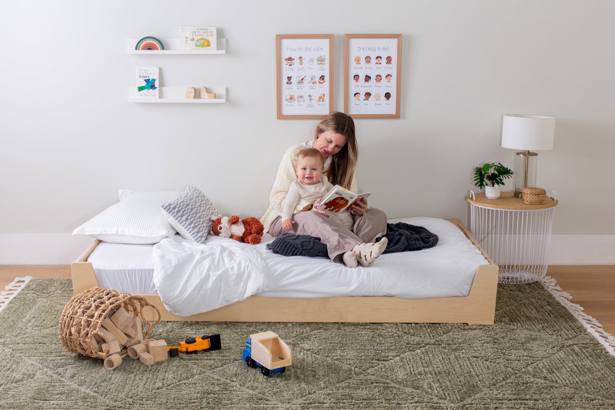 Woman on Floor Bed with Infant 