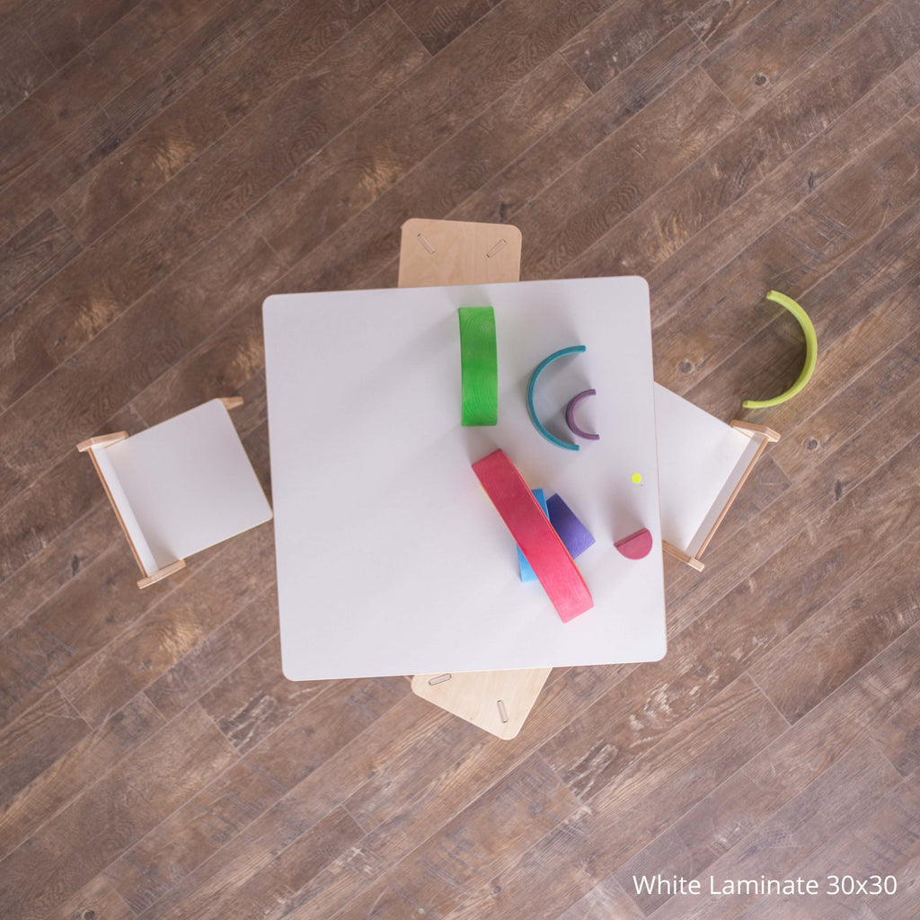 wooden kids table with chairs and blocks