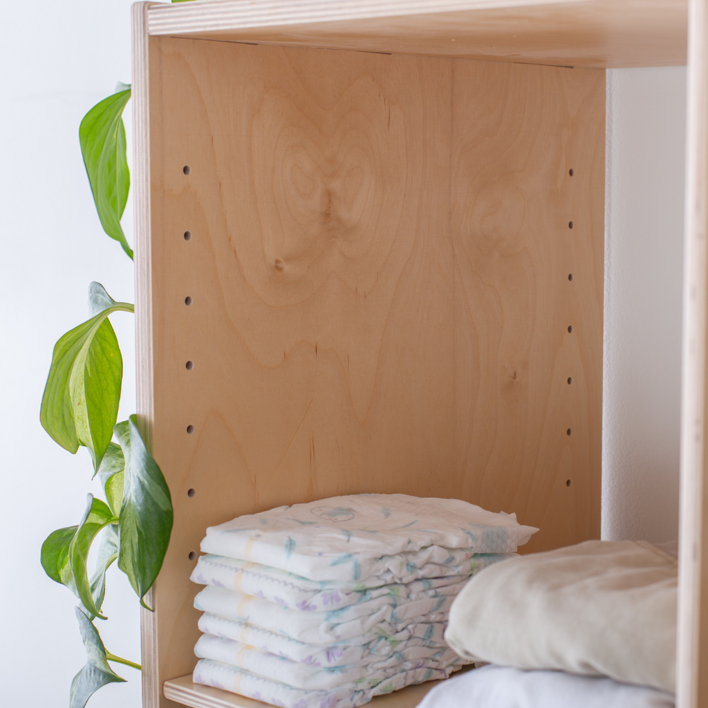 a detail shot of the adjustable dividers for the cube shelf