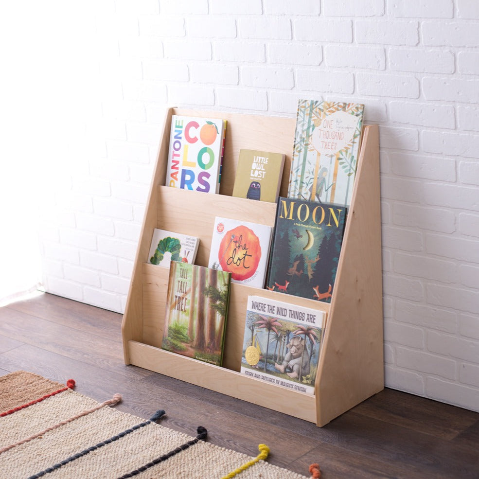 30in wide school book display shelf with assorted books in a studio setting.