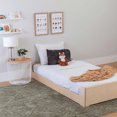 Twin Size Montessori Floor Bed in a child's bedroom