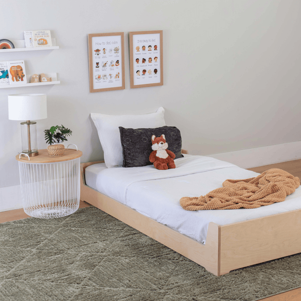 Twin Size Montessori Floor Bed in a child's bedroom