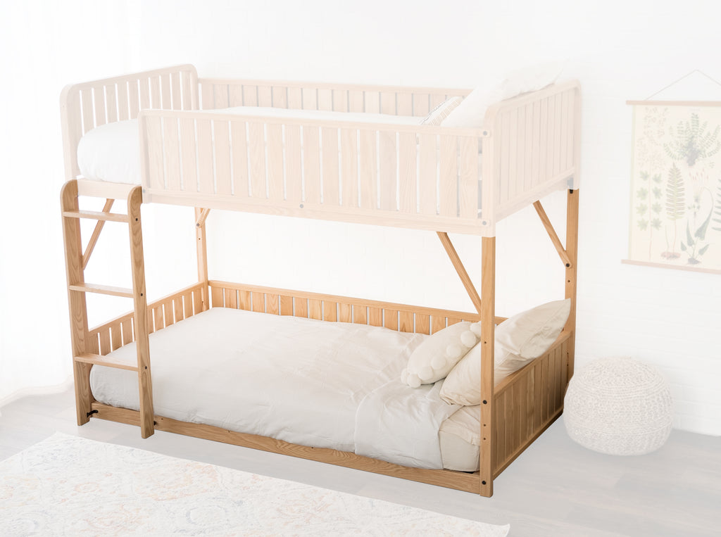 The bunk add-on portion of the Sosta Bunk Bed is in full opacity, while the surrounding bunk bed pieces are whited out