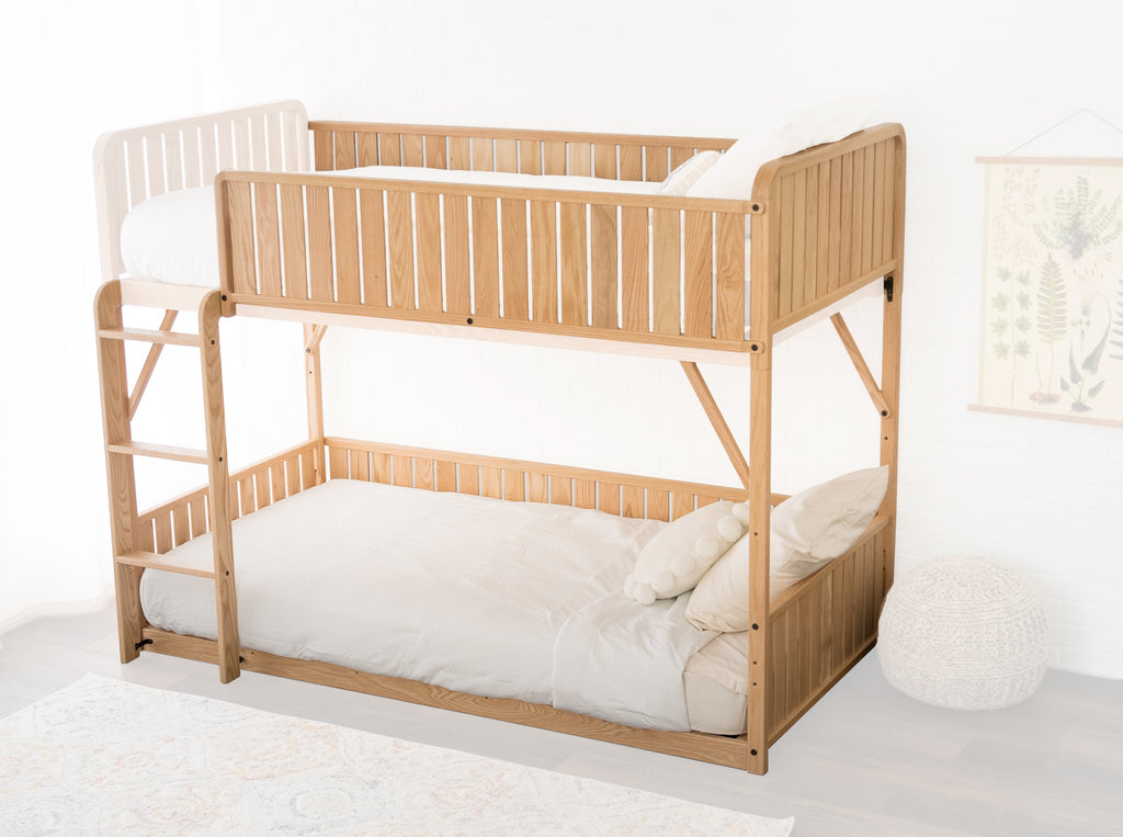 An image showing the twin bunk bed add-on, one full side, one headboard, and one 3/4 rail in full opacity