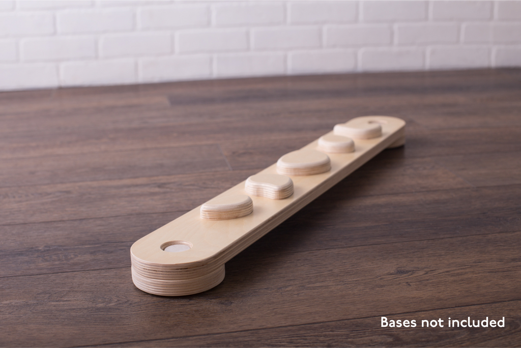 An indoor balance beam with stepping stones. 