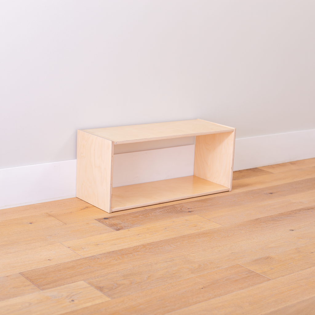 Short Backless Infant Shelf at an angle with no toys