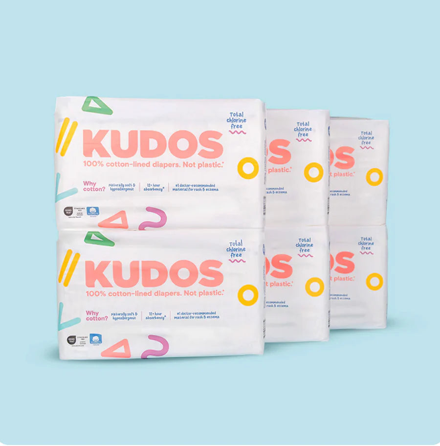 Kudos diapers packaging on a light blue background