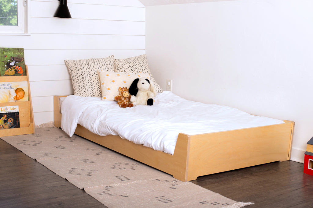 A Twin Floor Bed shown in a children's room