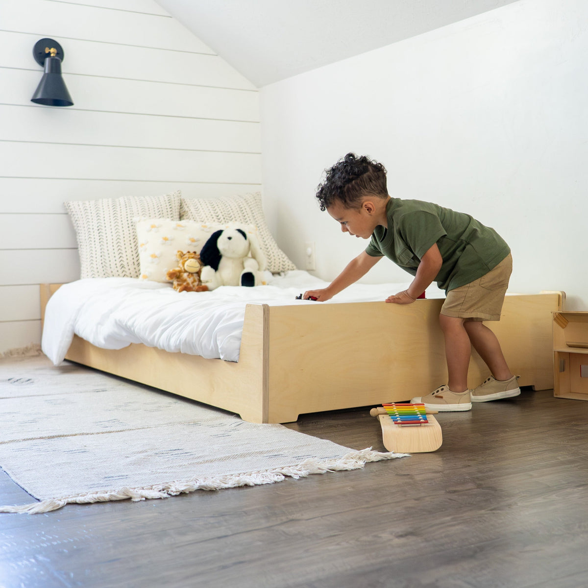 Toddler playing on Twin Size Floor Bed