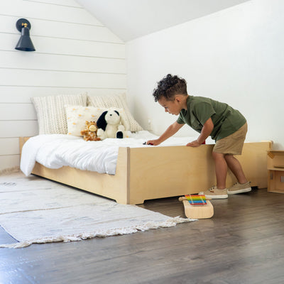 Toddler playing on Twin Size Floor Bed