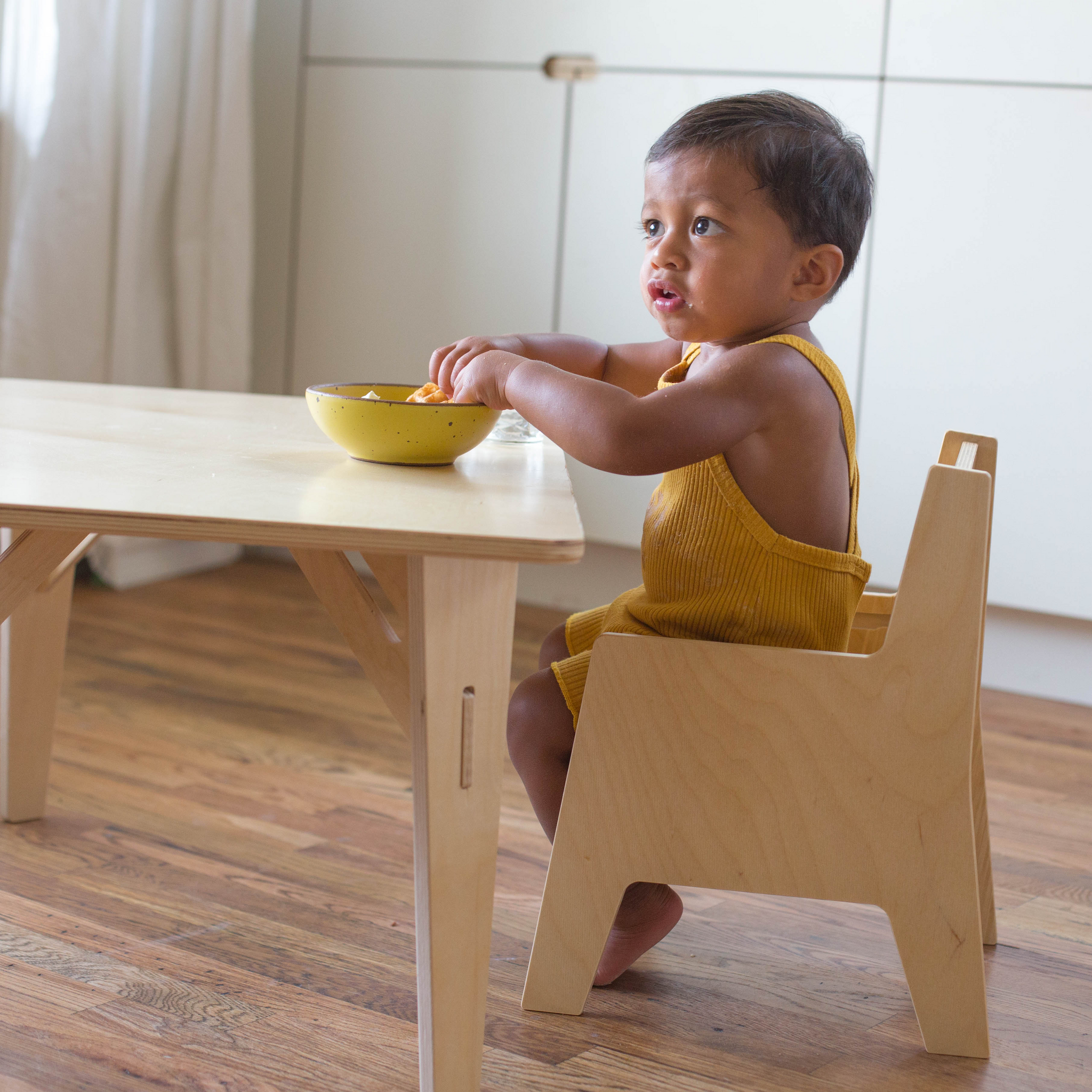 Adjustable table chair clearance