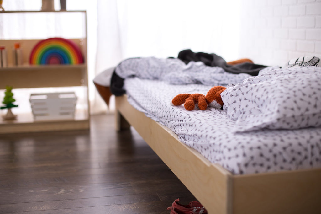 A Montessori Bed flipped to the taller configuration