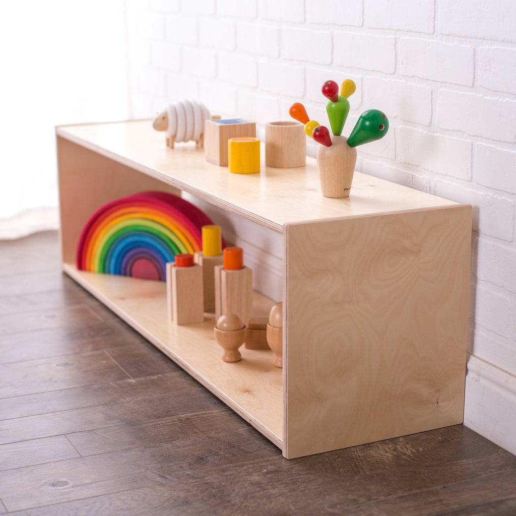 Long Montessori infant shelf with wooden toys