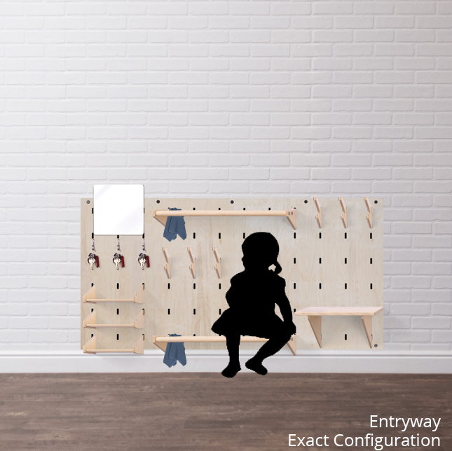 Large entryway Makerwall horizontally installed with a toddler girl for scale.